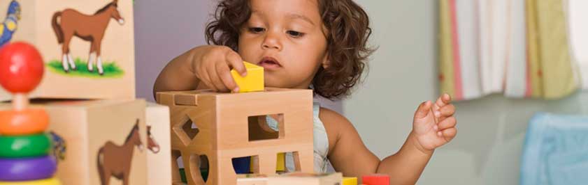 Girl Building with Blocks